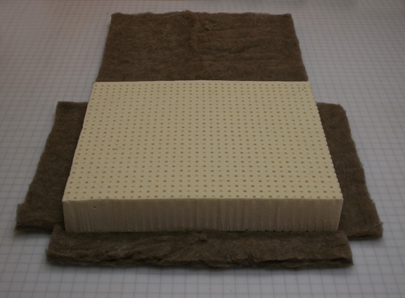latex cushion core ready to be wrapped in wool