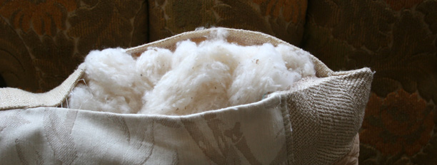 Close view of split seam with stuffing spilling out