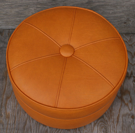 finished round ottoman with central button