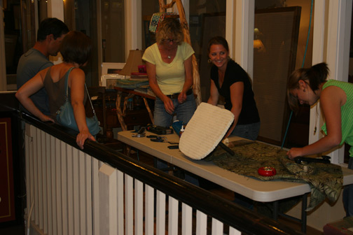 upholstery students, teacher and spectators