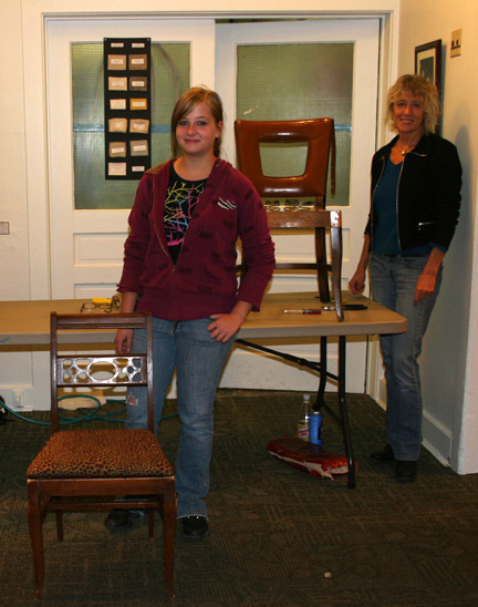 student with finished chair