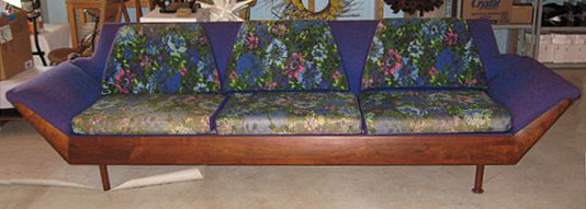 purple/floral 1965 sofa with wood accent