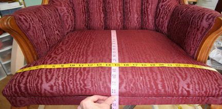 using a flexible tape to measure a 'tight' chair seat