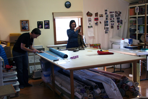 2 upholstery students at work in the studio