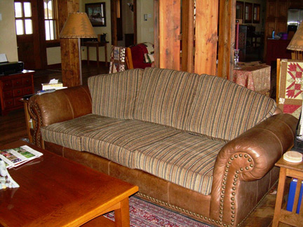 sofa with six nesw cushions