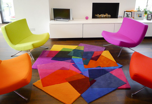 Bright multi-colored rug with matching chair colors