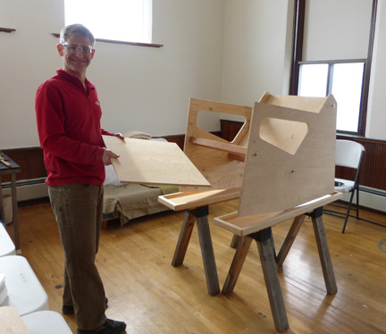 Upholstery student with his project 'Before'