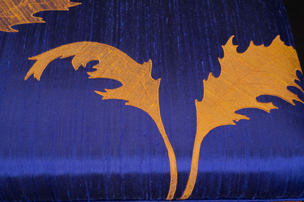 gold oak leaves on amethyst silk