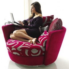 woman in large round chair