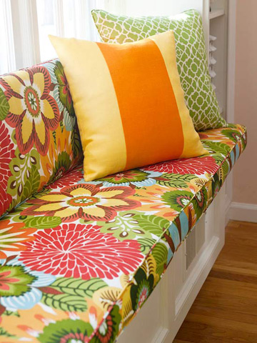 how to decorate a windowseat - bright colorful large print floral fabric - bhg
