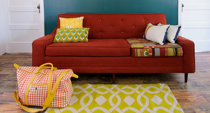 quirky orange sofa - multi colored butons -patchwork cushion - sarahphippsdesign
