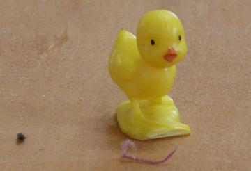 Tiny duck found inside chair during upholstery tear-down