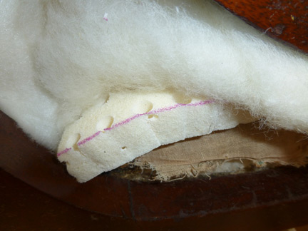 Organic wool and natural latex upholstery layers on vintage rocker restoration by Living Home Furniture