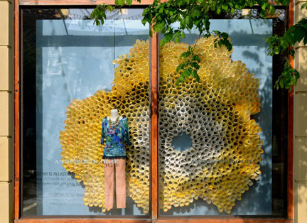 Fun design exercise: How to find fabric inspiration in Anthropologie window displays. Example: Earth Day paper display inspires Nina Jizhar's Mum fabric