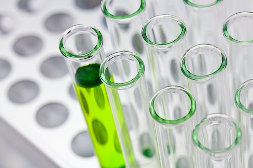 green chemical in test tubes